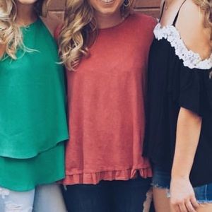 red tee with fun sleeves